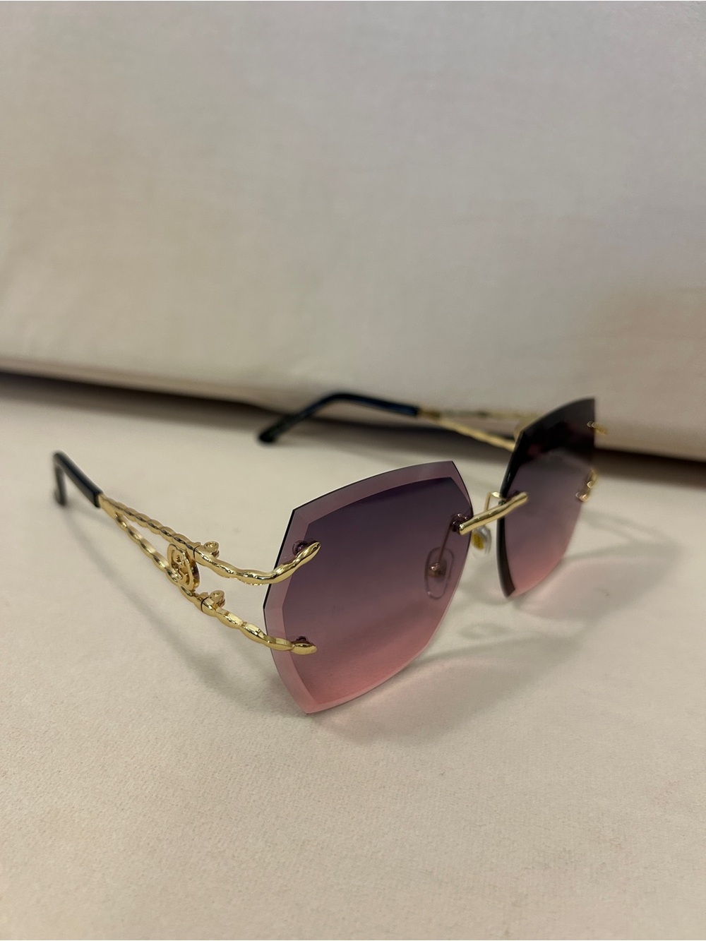 Rimless Pink Gradient Women's Sunglasses with Gold Accents